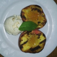 New dessert at the restaurant: grilled peaches with honey drizzle and coconut milk ice cream.